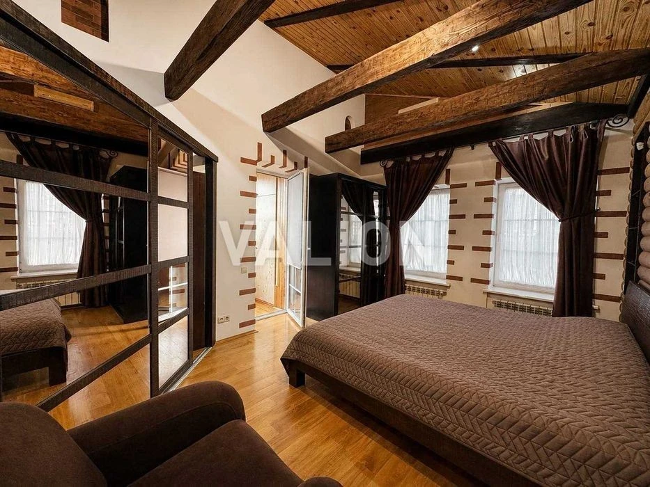 For sale a two-room apartment in Podil in the style of a chalet with a fireplace