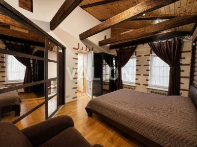 For sale a two-room apartment in Podil in the style of a chalet with a fireplace