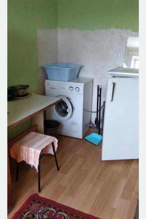 Gostinka, the first building of the Malysheva metro station