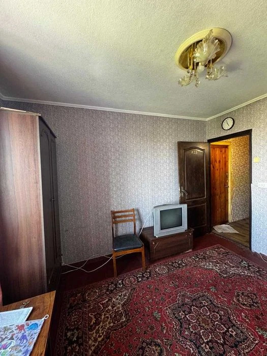 I'm selling a small hotel room at 107 Newton Street.