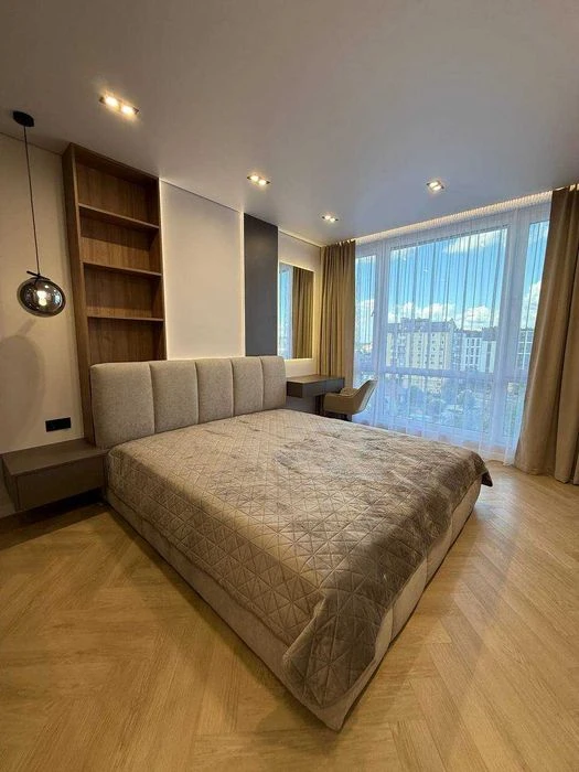I am selling a designer 3-room apartment, near the city lake