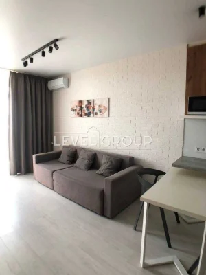 Modern studio apartment for sale in Standard One residential complex near the metro