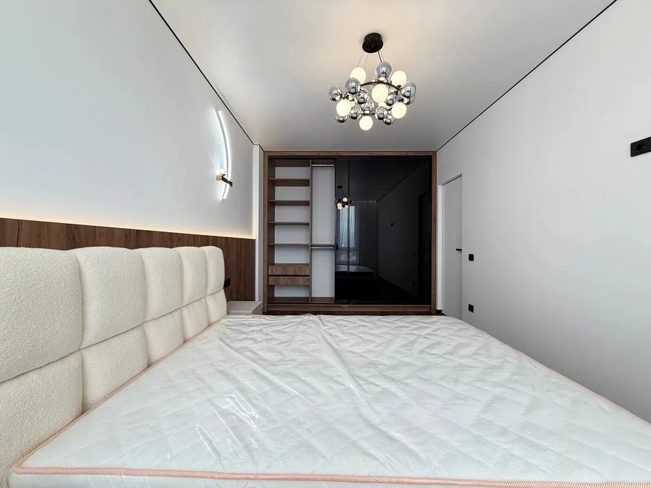 One-room apartment with furniture and appliances near the lake