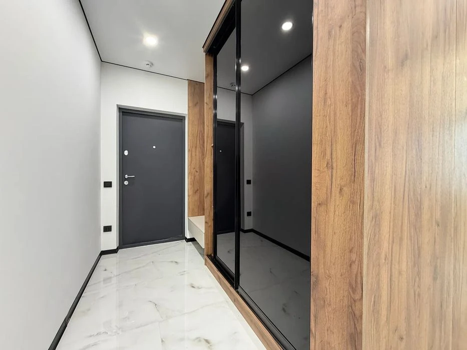 One-room apartment with furniture and appliances near the lake