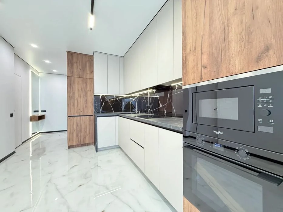 One-room apartment with furniture and appliances near the lake
