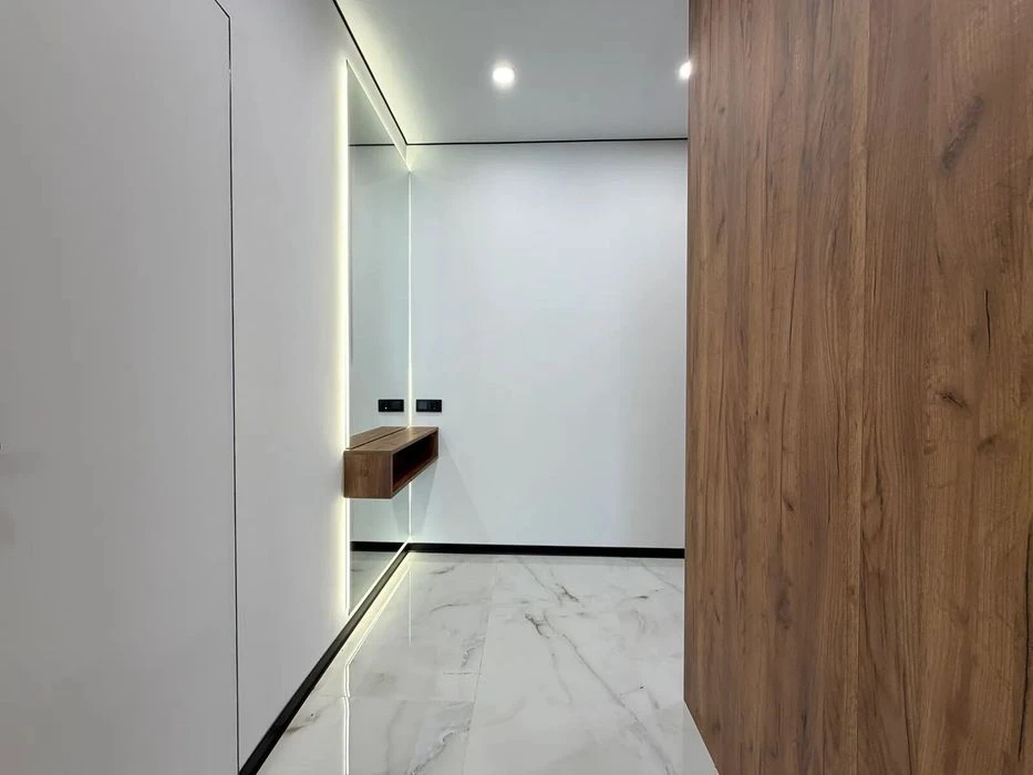 One-room apartment with furniture and appliances near the lake