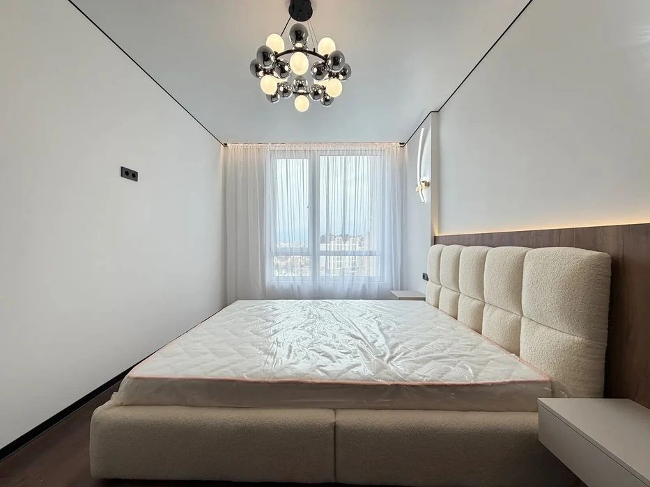 One-room apartment with furniture and appliances near the lake