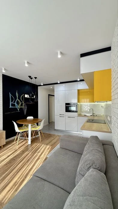 Sale of a 2-room apartment of 60 m² "Euro three" with designer furniture