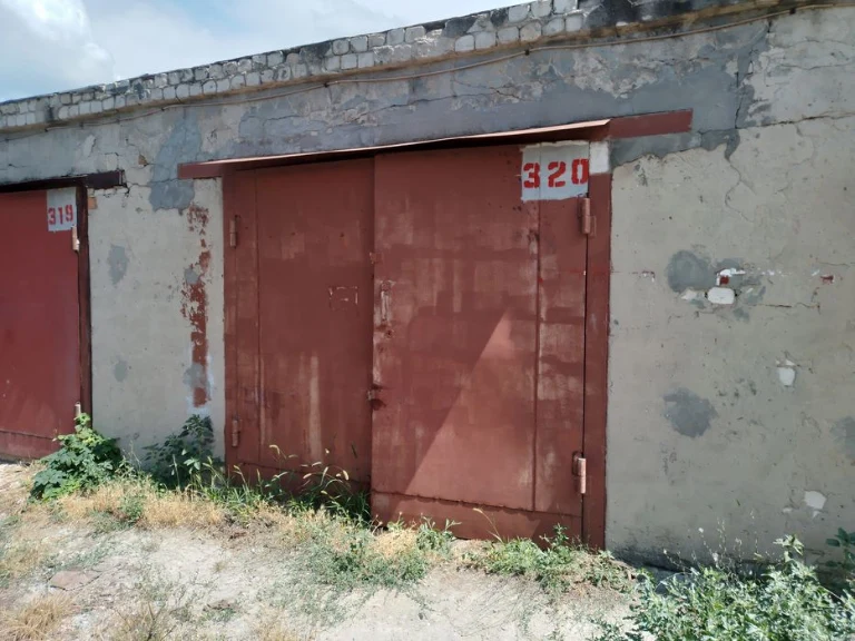 A stone garage with a large basement is for sale in Odessa, Suvorov