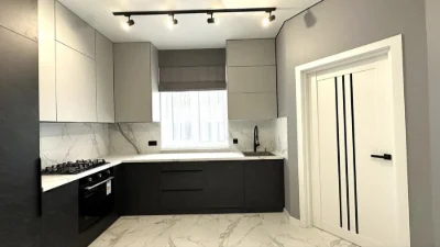 Townhouse / Duplex with renovation, city limits, gas heating