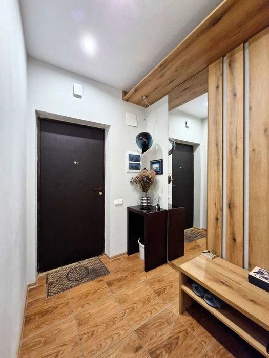 I am selling a large apartment of 60m. 1 bedroom + kitchen-living room of 25m.