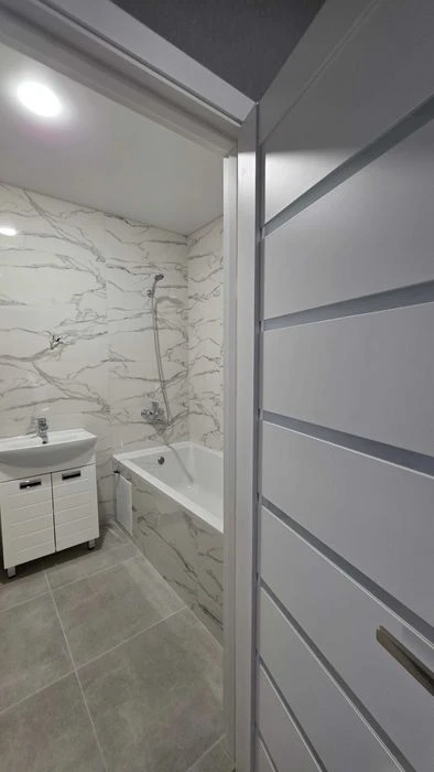 Selling a 2-room apartment in the Pobeda residential complex, a new building with new renovations!