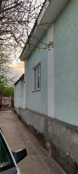 Продам 1/2 будинку в Центрі