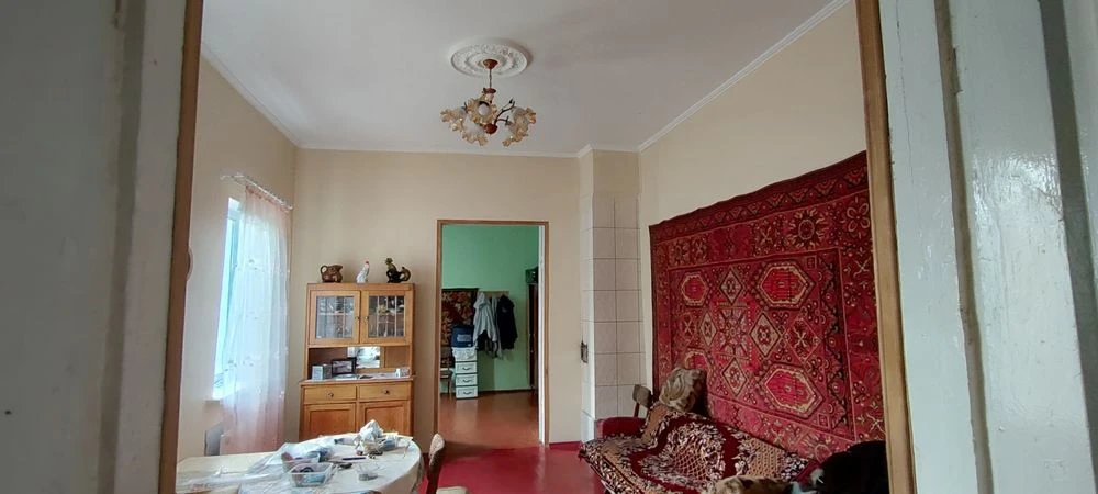 Продам 1/2 будинку в Центрі