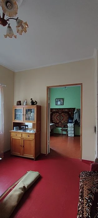 Продам 1/2 будинку в Центрі