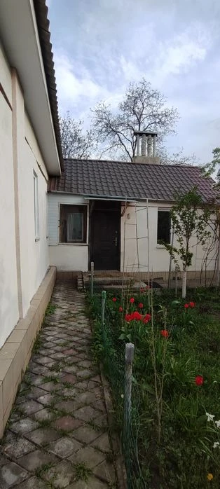 Продам 1/2 будинку в Центрі