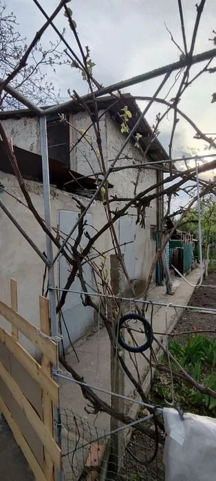 Продам 1/2 будинку в Центрі