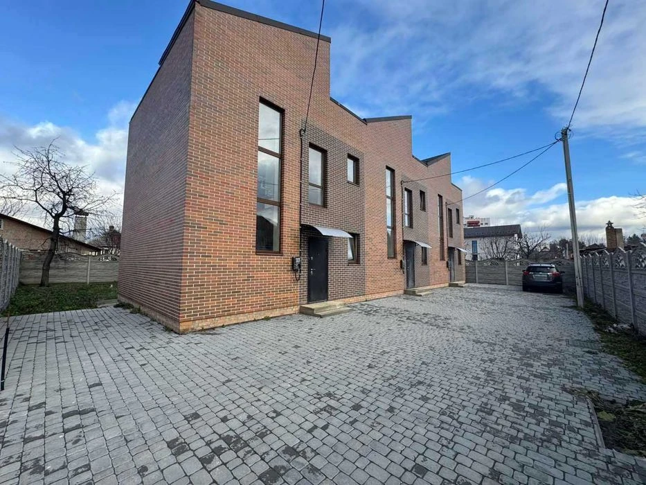 Sale of a modern two-story townhouse in the Old Town