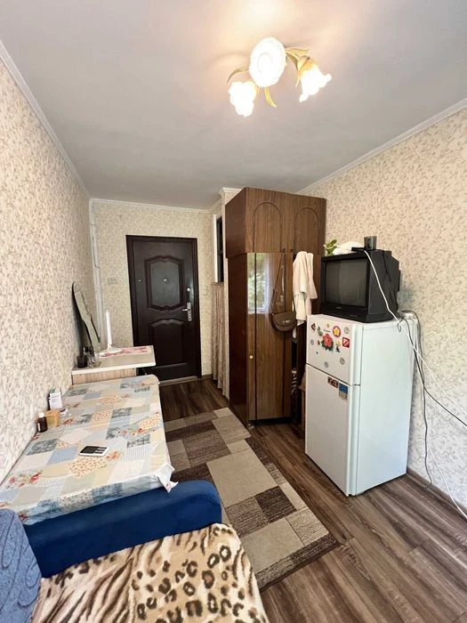 Продам комнату в коммунальной квартире на средн. этаже на