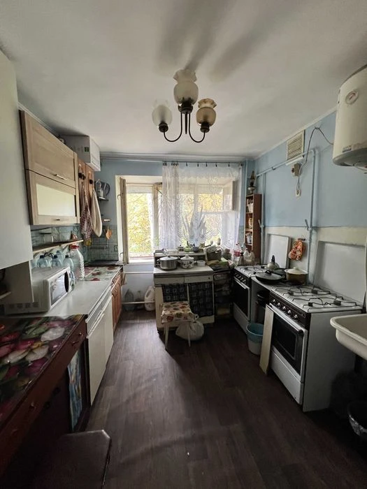 Продам комнату в коммунальной квартире на средн. этаже на