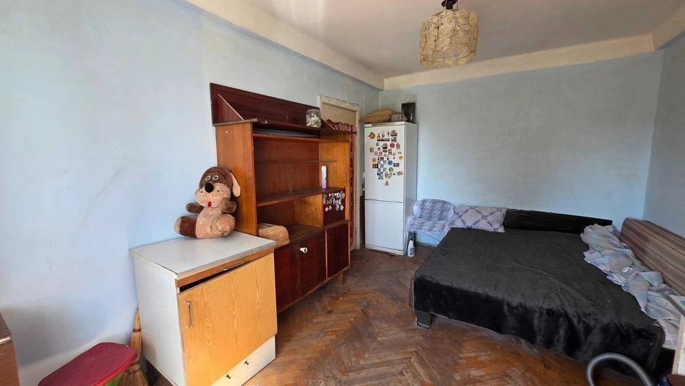 Продаж кімнати 22 м² комунальної квартири вул. Світлицького,