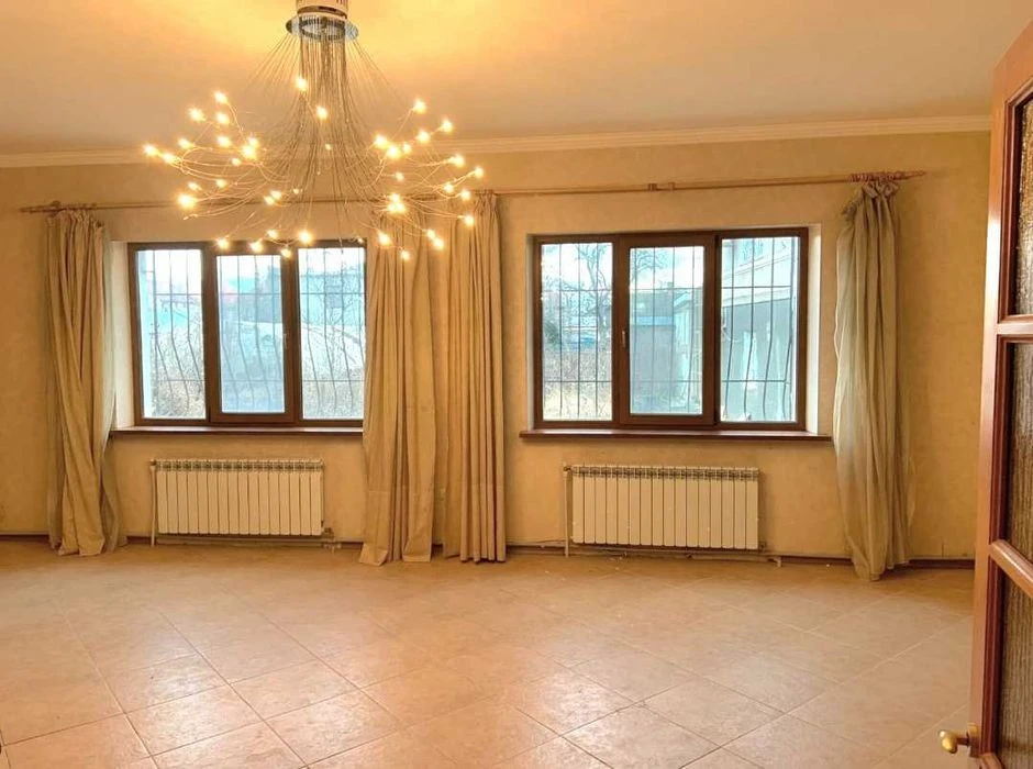 I am selling a 2-story capital house on 4 acres of land.