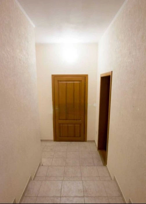 I am selling a 2-story capital house on 4 acres of land.