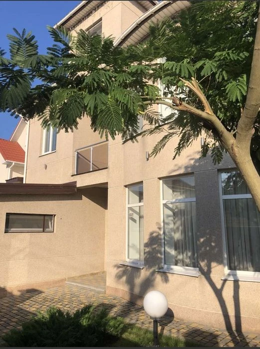 House with plot. Golden slide