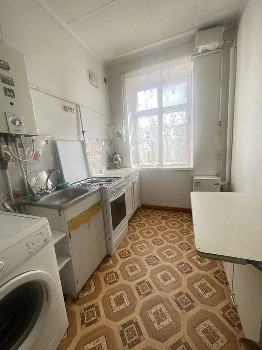 Продаж  2 квартири Ц. Ринок Рюмина