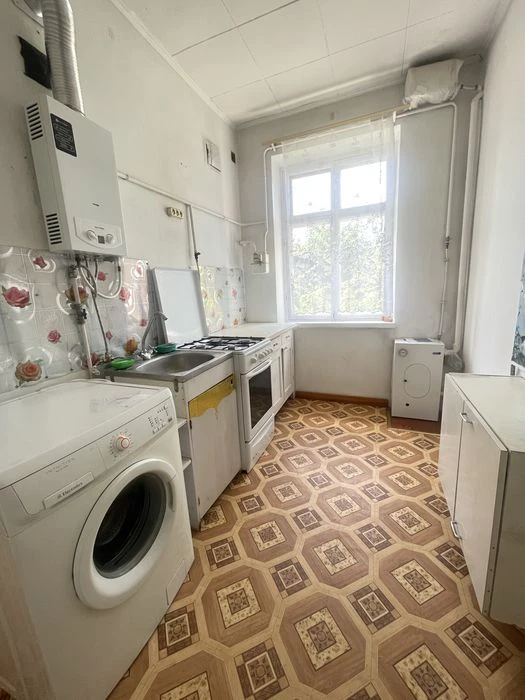 Продаж  2 квартири Ц. Ринок Рюмина