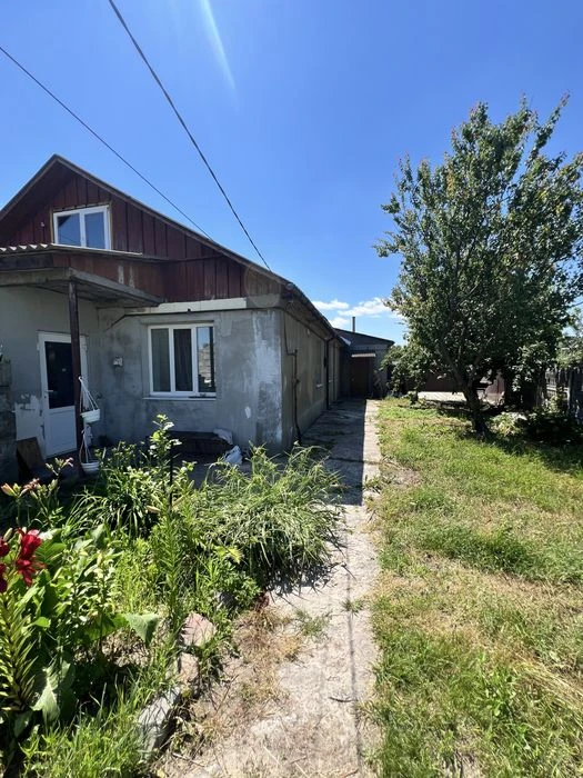Продам окремий будинок з ремонтом( Масани)