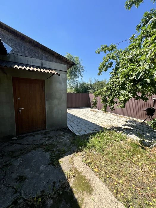 Продам окремий будинок з ремонтом( Масани)