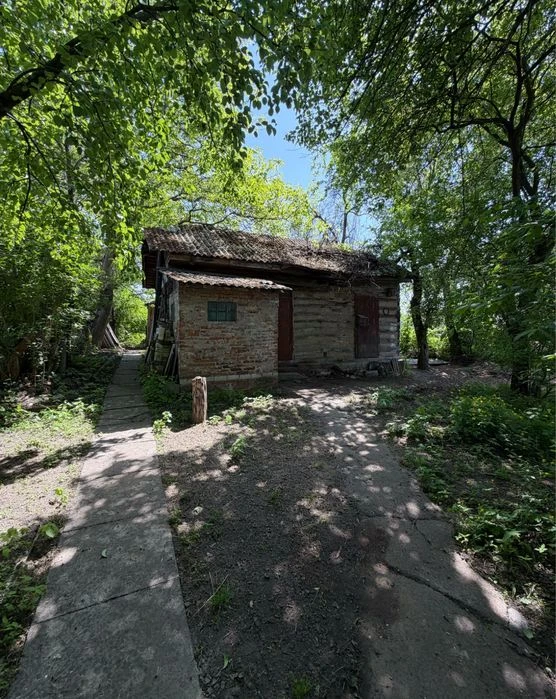 Продаж частини будинку з ділянкою в центрі Чернігова (вул. К