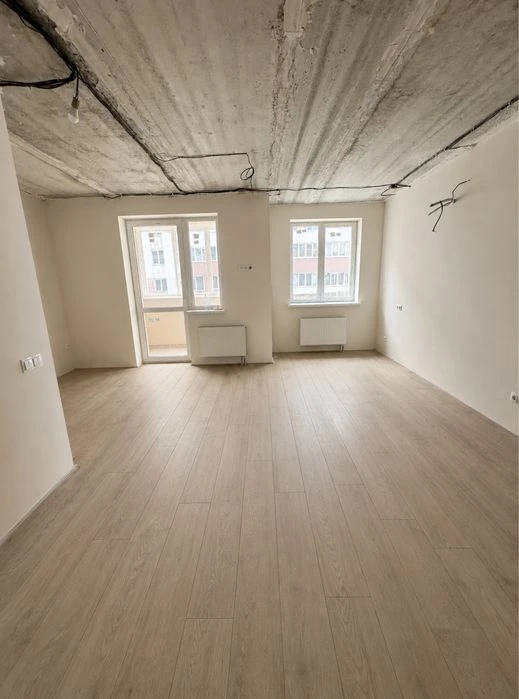 Sale of a 1-room apartment in a new building - the lowest price in the