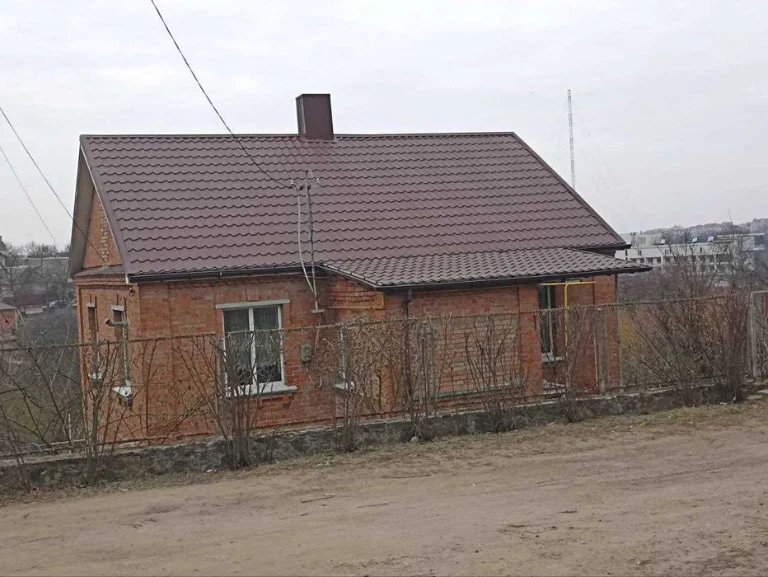 House for sale with a two-story garage near the center