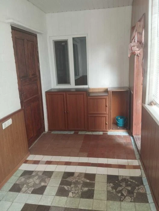 Продам 1/2 будинка район ХТЗ