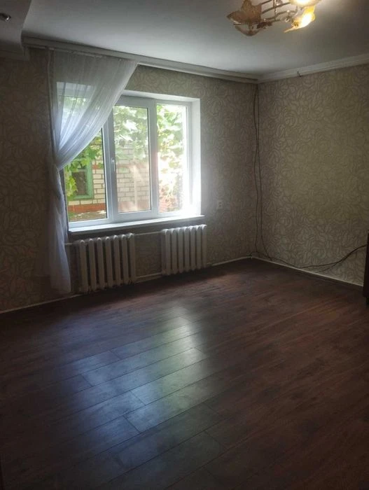 Продам 1/2 будинка район ХТЗ