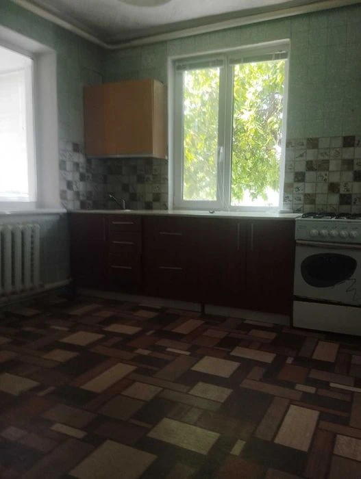 Продам 1/2 будинка район ХТЗ