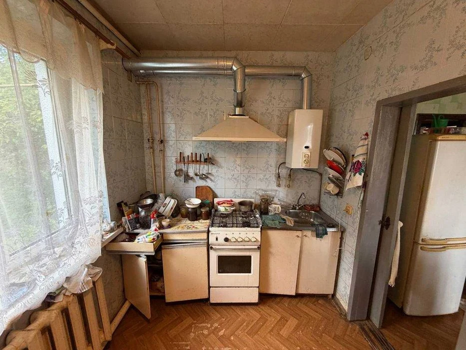 ЗНИЖЕННЯ ЦІНИ! Продам будинок у Полтаві із земельною ділянко