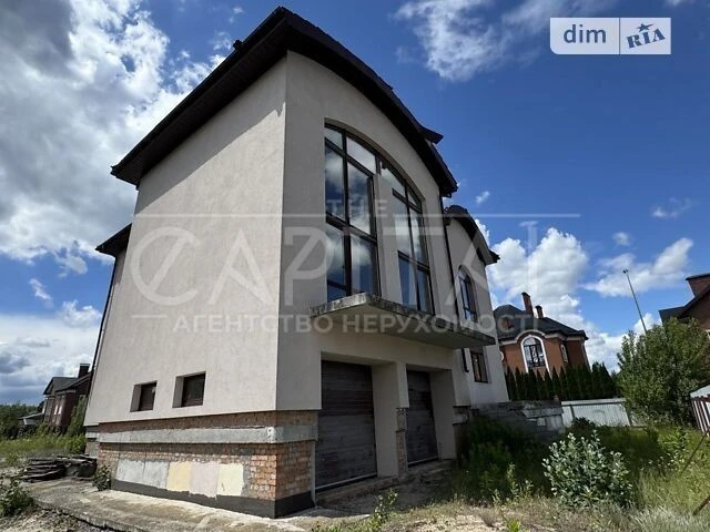 Продаж 2 поверхового будинку з гаражем і ділянкою на 10 сото