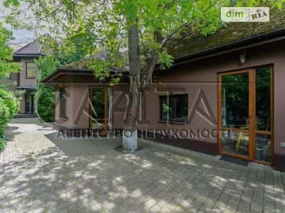 Продаж 2 поверхового будинку з гаражем і ділянкою на 9 соток