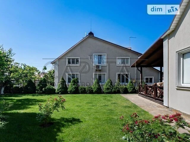 Продаж 2 поверхового будинку з гаражем і ділянкою на 10 сото