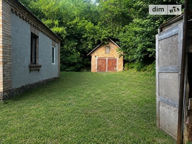 Продаж 1 поверхового будинку з гаражем і ділянкою на 6 соток