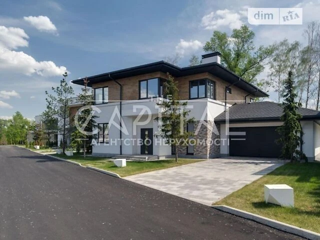 Продаж 2 поверхового будинку з гаражем і ділянкою на 12 сото
