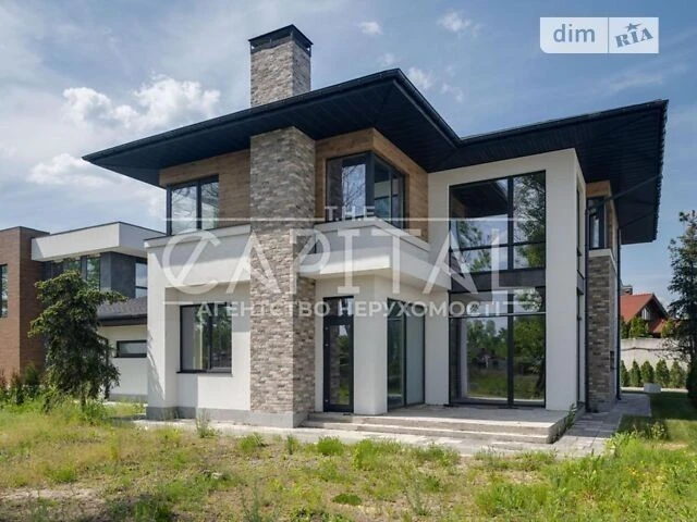 Продаж 2 поверхового будинку з гаражем і ділянкою на 12 сото