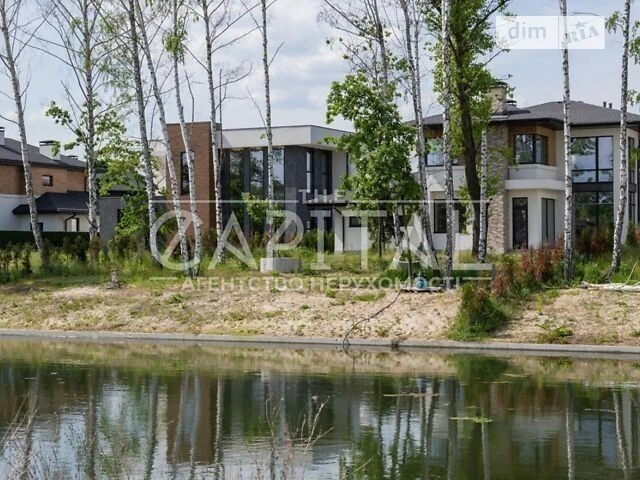 Продаж 2 поверхового будинку з гаражем і ділянкою на 12 сото