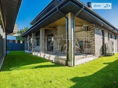 Продаж 2 поверхового будинку з гаражем і ділянкою на 7 соток