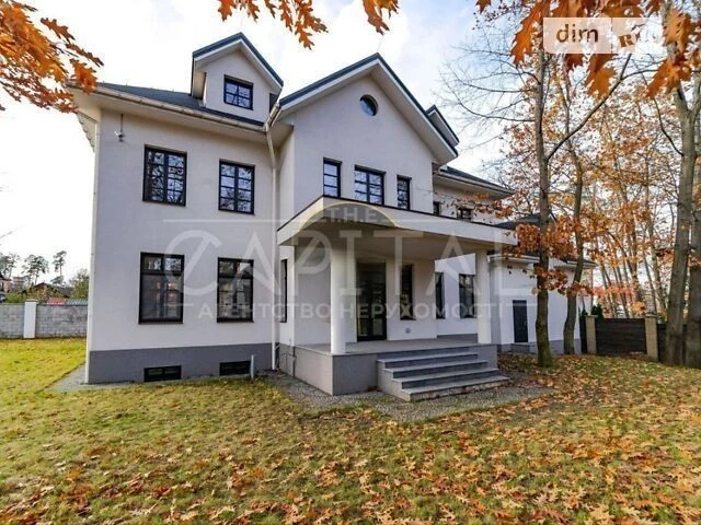 Продаж 2 поверхового будинку з гаражем і ділянкою на 10 сото