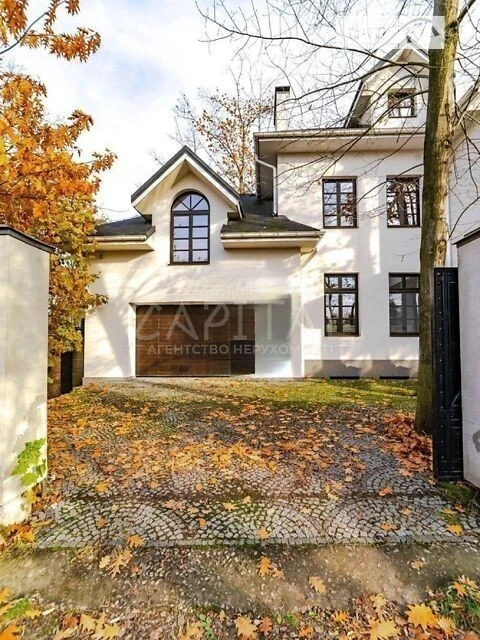 Продаж 2 поверхового будинку з гаражем і ділянкою на 10 сото