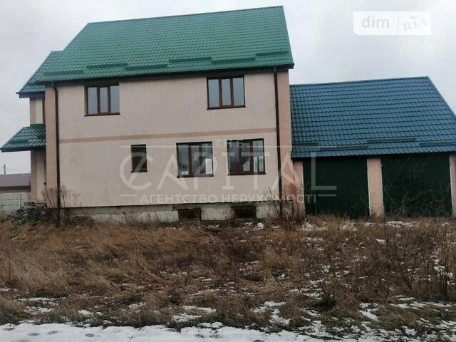 Продаж 2 поверхового будинку з гаражем і ділянкою на 10 сото